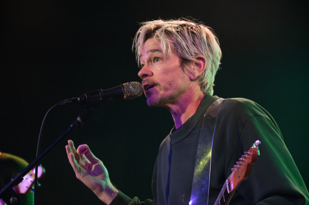 Closeup of Nate Ruess singing into the mic at Crescent Ballroom
