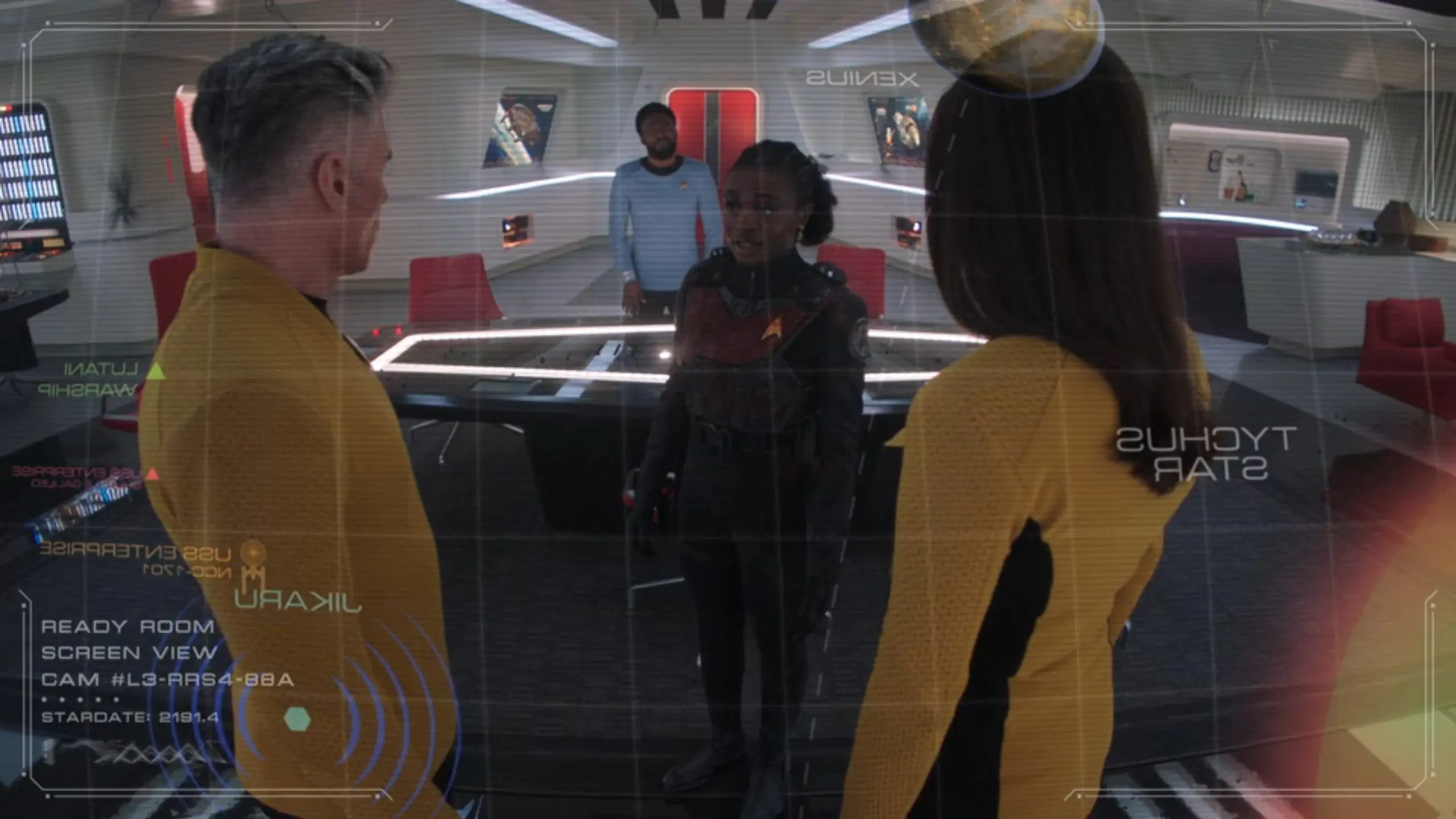 Captain Christopher Pike, Lieutenant Commander Una Chin-Riley, Cadet Nyota Uhura, and Dr. Joseph M’Benga viewed through a tactical display.