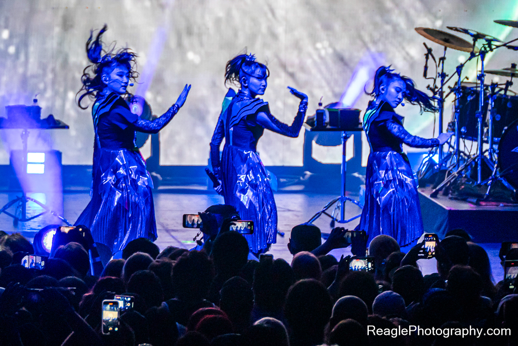 BABYMETAL dancing while shrouded in blue light