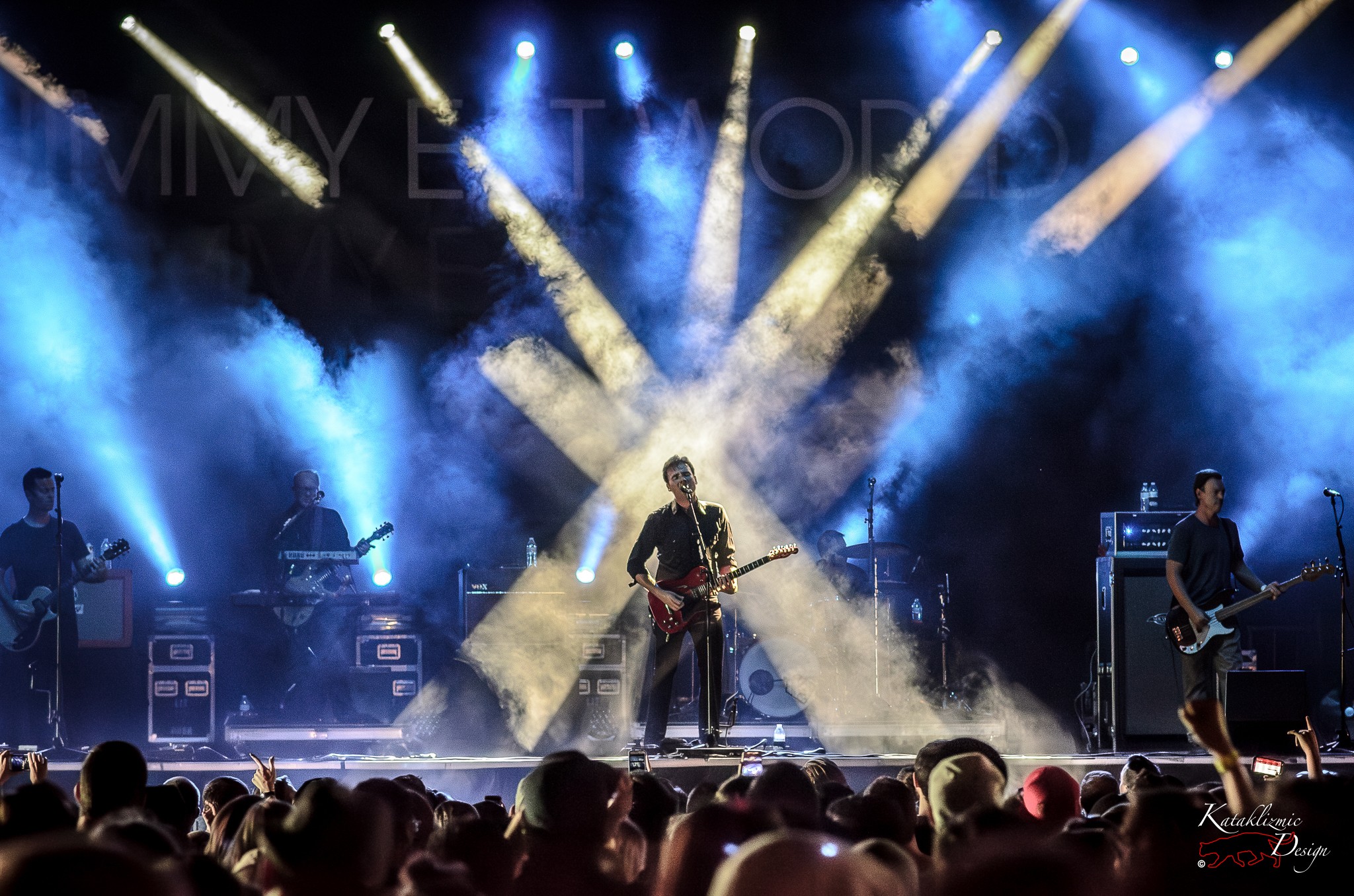 Jimmy Eat World under dramatic X-shaped beams of light at the Summer Ends Music Festival in Tempe, Arizona on September 25, 2015.