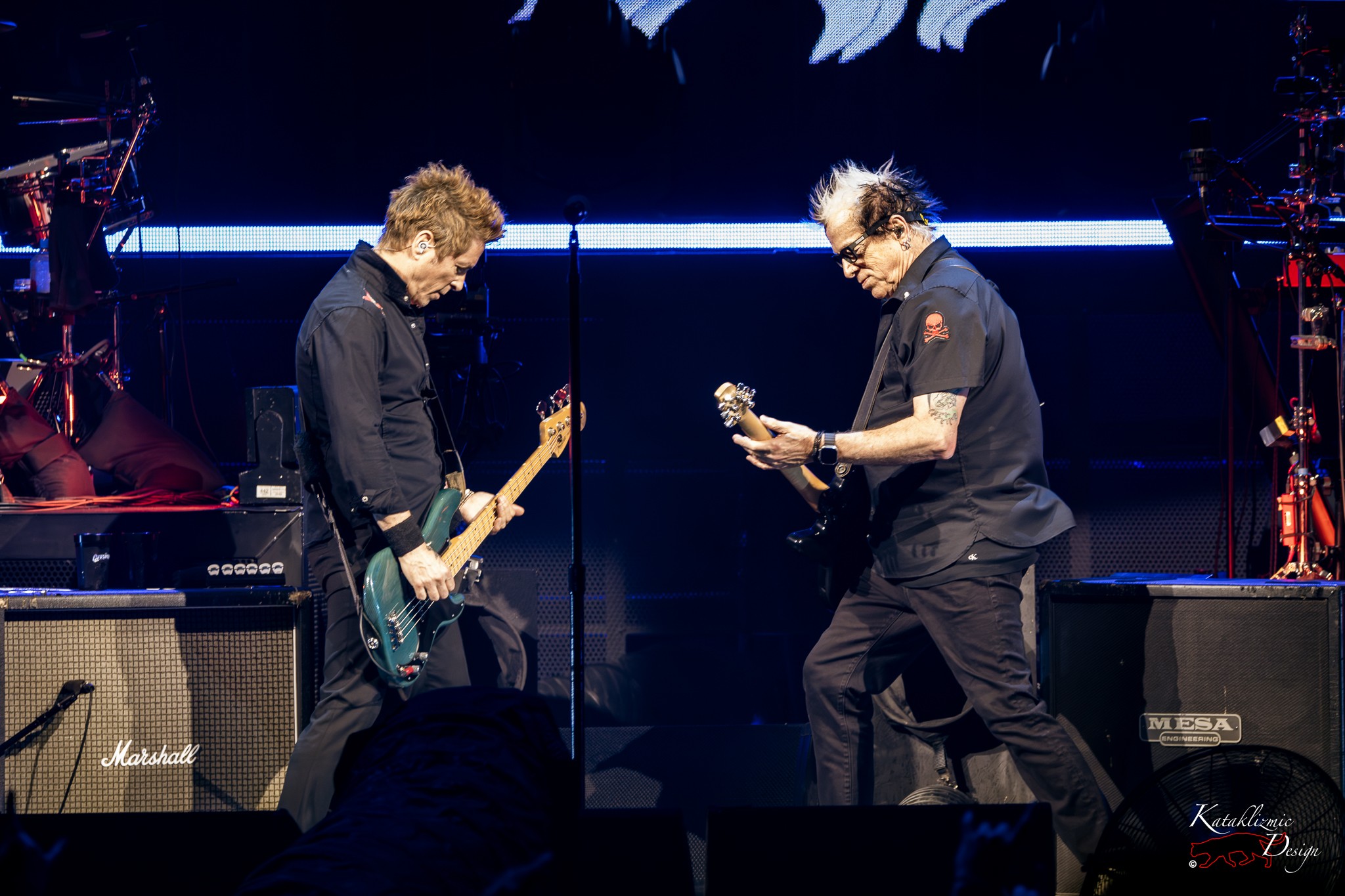 Kevin "Noodles" Wasserman on lead guitar and Todd Morse on bass performing together during The Offspring’s set at the Supercharged Tour in Phoenix.