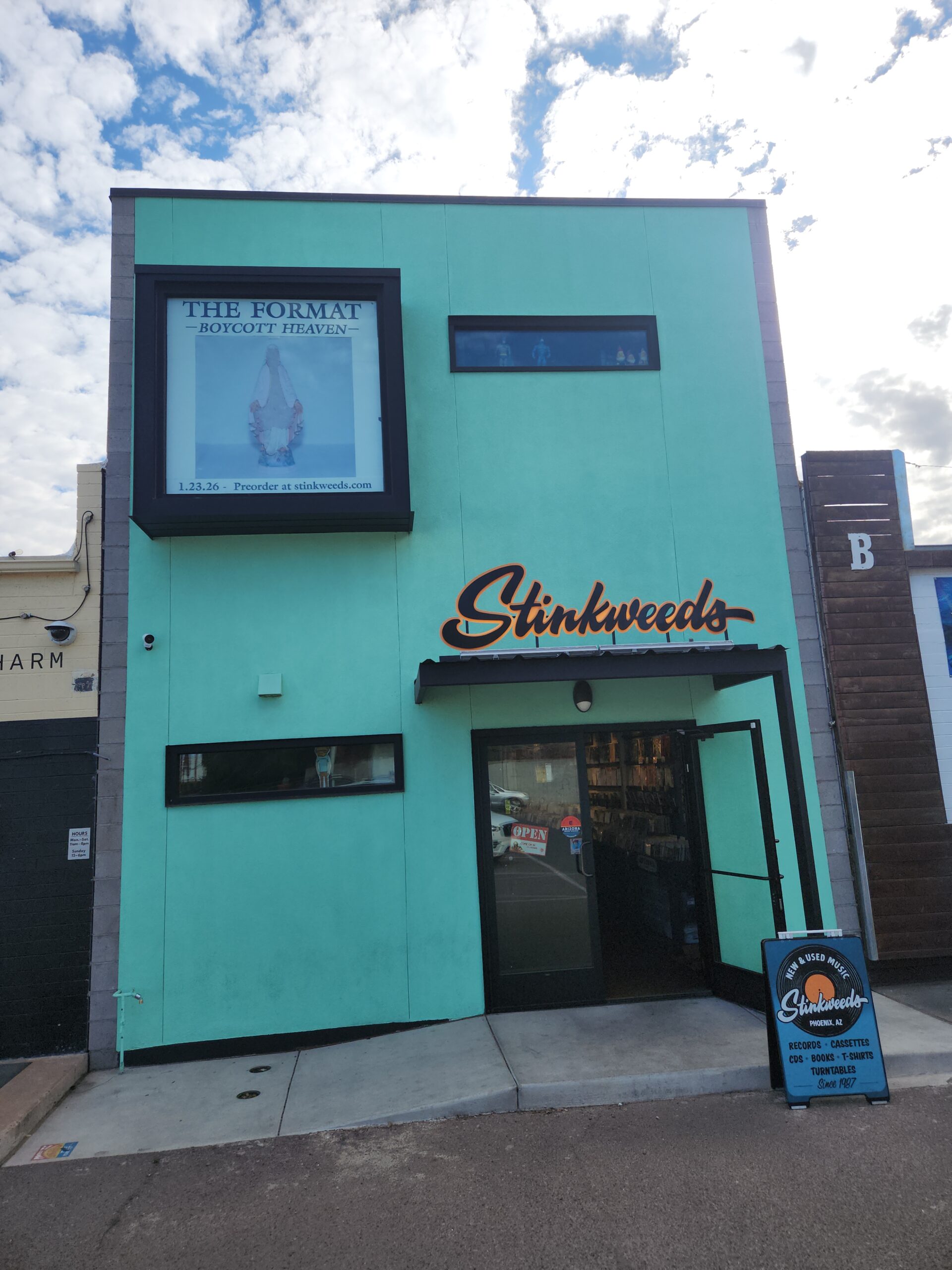 Stinkweeds Records storefront in Phoenix, Arizona displaying The Format's Boycott Heaven album poster promoting the January 23, 2026 preorder.