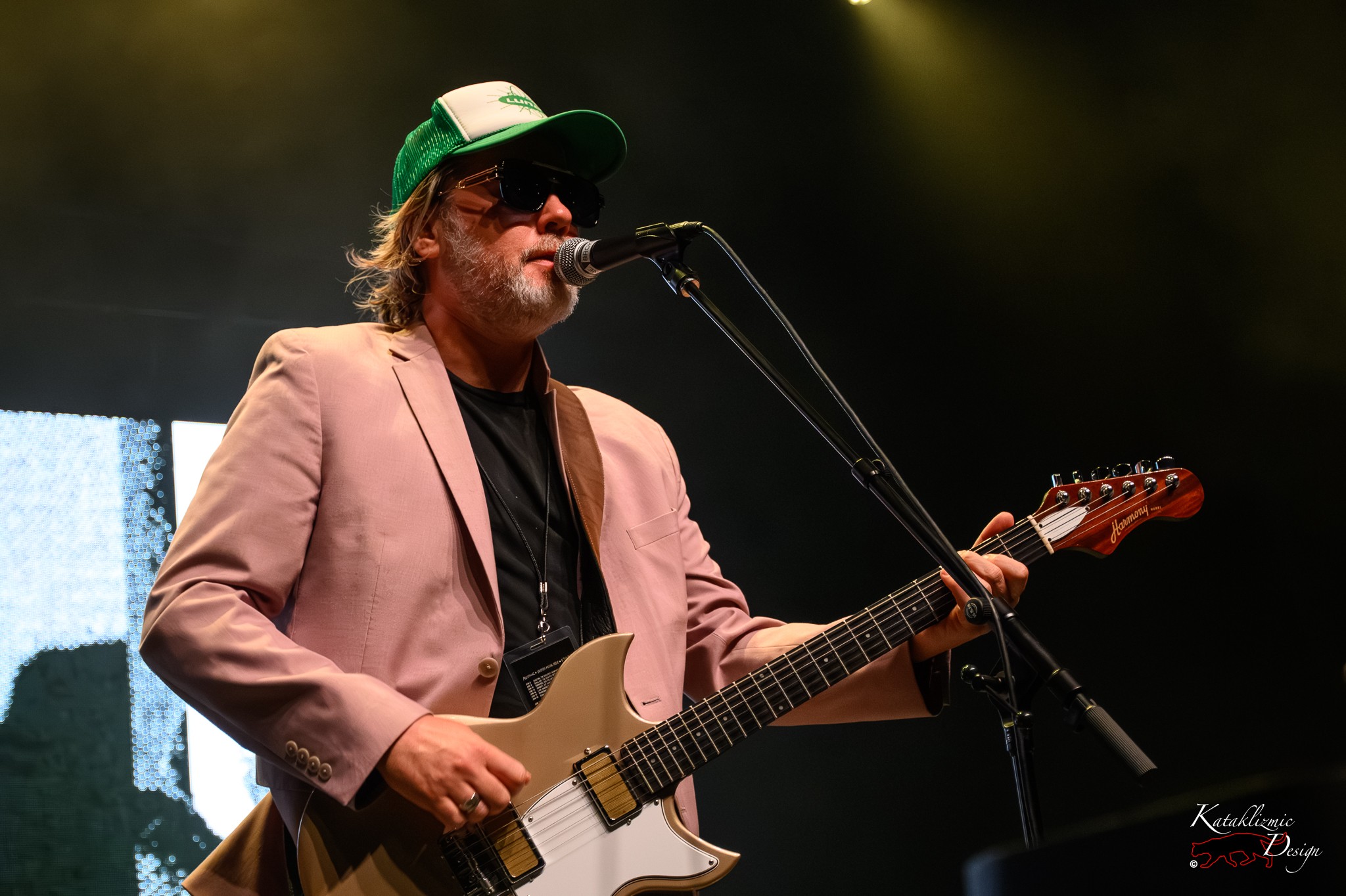 Kevin Drew of Broken Social Scene sings and plays guitar onstage.