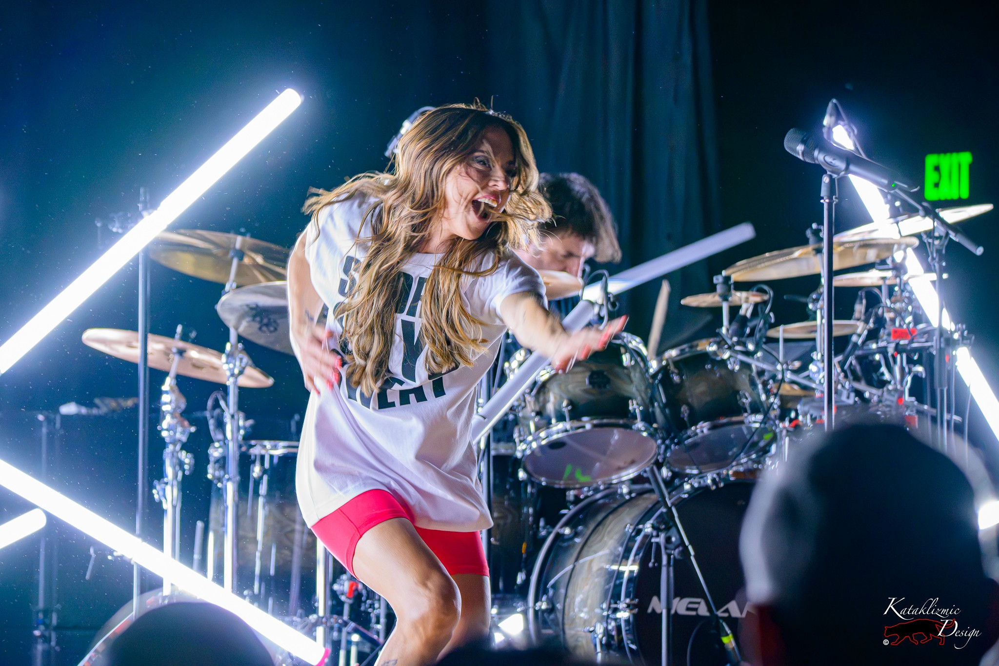 Melanie C dances exuberantly across the stage as the live band performs behind her during The Melanie C World Tour at House of Blues San Diego.